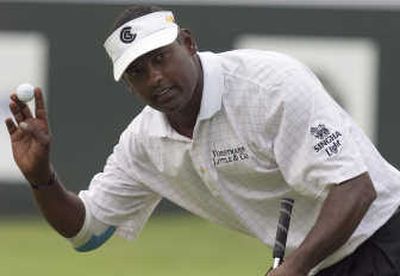 
Vijay Singh waves after putting out on the 18th hole in second-round action at the Canadian Open. Associated Press
 (Associated Press / The Spokesman-Review)