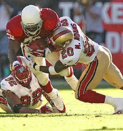 
Cardinals running back Emmitt Smith, the NFL's all-time leading rusher, will be on the same field as Jerry Rice for what could be the final time Sunday.
 (Associated Press / The Spokesman-Review)