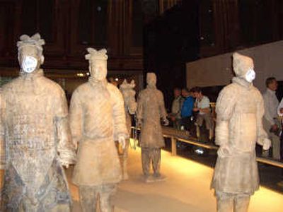 
The British Museum is reviewing its security after an environmental protester put face masks on Chinese  terra cotta figures. Associated Press
 (Associated Press / The Spokesman-Review)