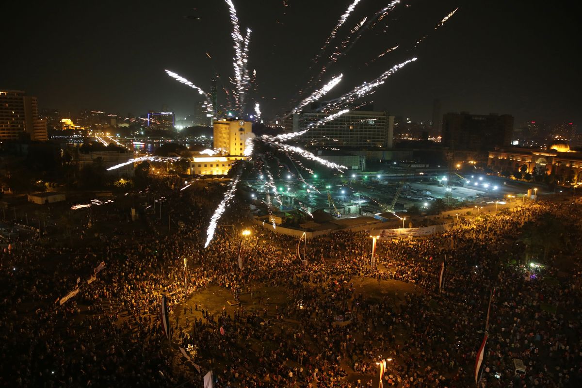 Supporters of Egyptian President Abdel-Fattah el-Sissi celebrate his inauguration in Tahrir Square in Cairo on Sunday. (Associated Press)