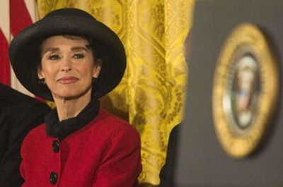 
Rita Moreno listens to President Bush in June of 2004 as she receives the Presidential Medal of Freedom, the nation's highest civil award. Moreno's awards include an Emmy, a Tony, an Oscar, a Grammy and a Golden Globe.
 (Knight Ridder / The Spokesman-Review)