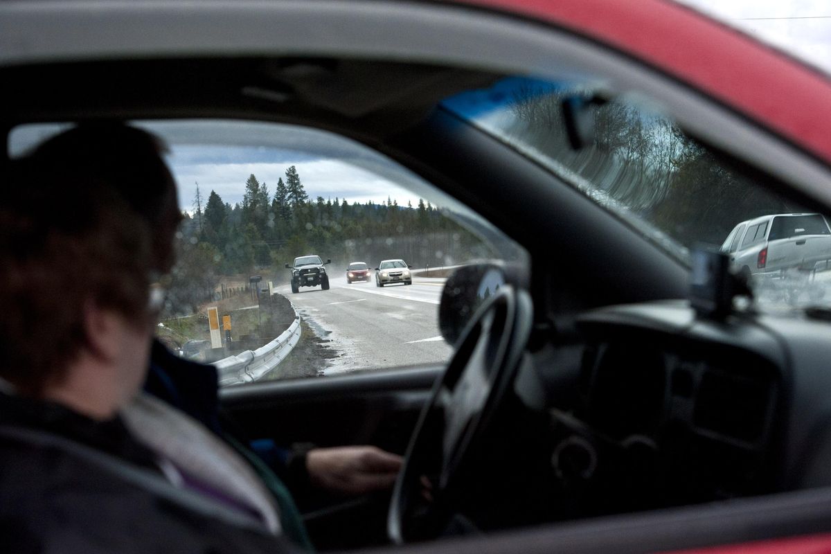 A driver waits to turn onto U.S. Highway 95 where the four-lane freeway ends, just south of the Kootenai-Bonner county line on Friday, April l7, 2017. That stretch of road is one of two major construction projects on U.S. 95 in North Idaho that are top candidates to get funded from the big transportation bill that Idaho lawmakers passed, which includes $300 million in new highway bonding. (Kathy Plonka / The Spokesman-Review)