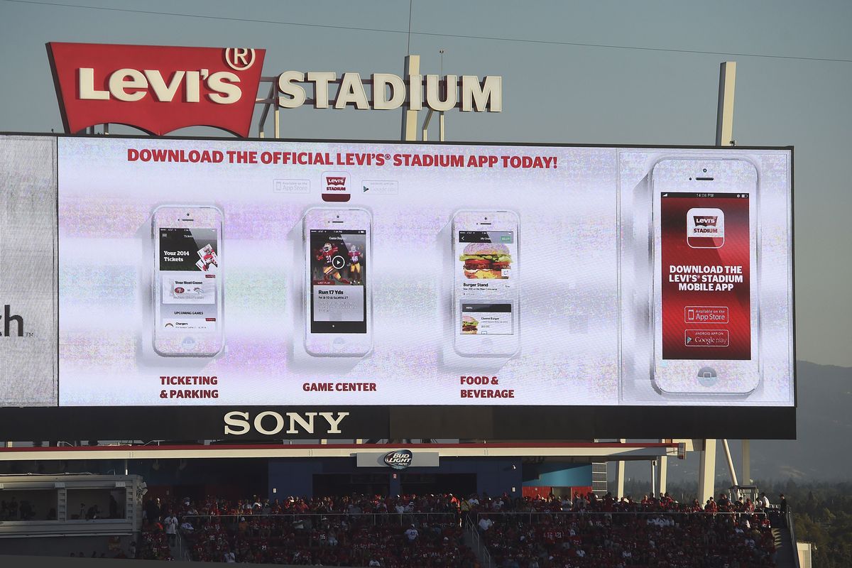 A screen at Levi’s Stadium advertises the stadium’s app for smartphones during an NFL football game Sept. 14 in Santa Clara, Calif. (Associated Press)