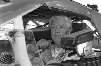 
James Hylton adjusts his seat belt during NASCAR testing at Daytona International Speedway earlier this month. 
 (Associated Press / The Spokesman-Review)