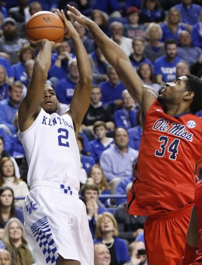 Kentucky's Aaron Harrison poured in 26 points in overtime win. (Associated Press)