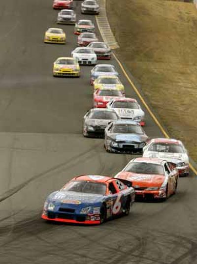 Jason Bowles ahead of Joey Logano and most of the field. (Photo Credit: Getty Images for NASCAR) (Ezra Shaw / The Spokesman-Review)