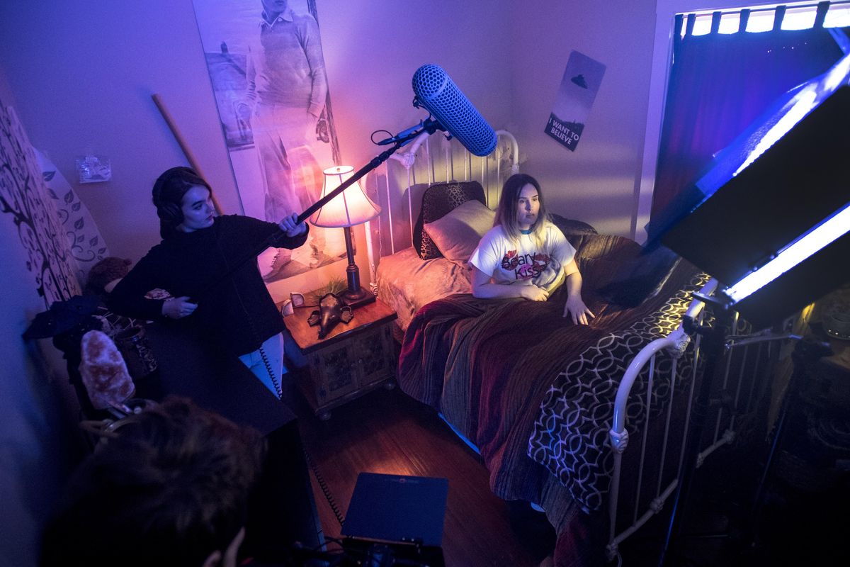 Izzy Girtz operates the boom as actor Amy Hille performs a scene from Noir Bizarre’s 50 Hour Slam short film called “Update in Progress.” (Colin Mulvany / The Spokesman-Review)