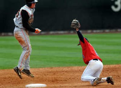 
Gonzaga second baseman Jason Chatwood tags Oregon State's John Wallace in the fourth inning. 
 (Rajah Bose / The Spokesman-Review)