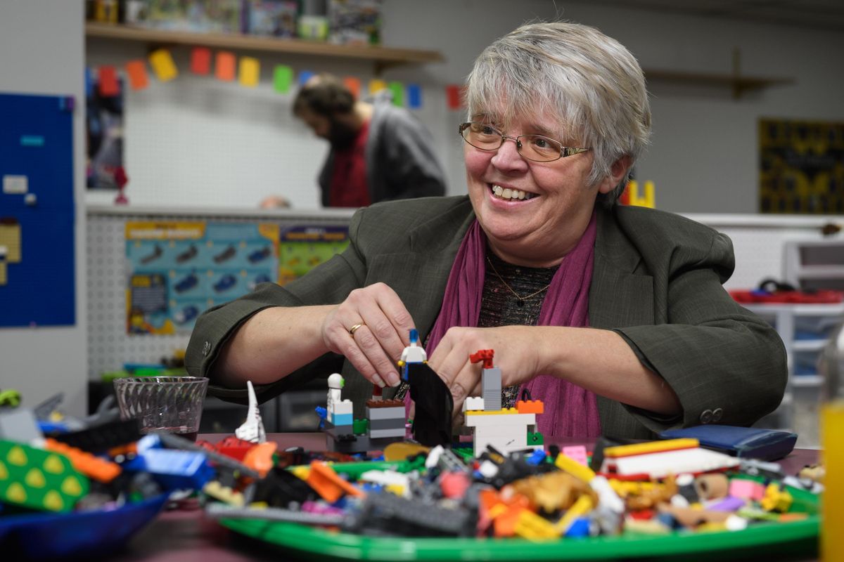 Cris McDonough, 57, of Connellsville, Pa. builds Legos during a BYOB adults-only build event at Brooke’s Block Party, an event space. (Justin Merriman / For The Washington Post)