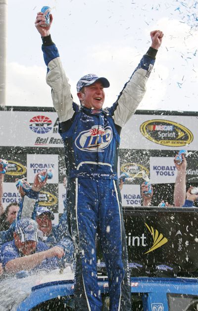Kurt Busch celebrates after his backward victory lap. (Associated Press / The Spokesman-Review)