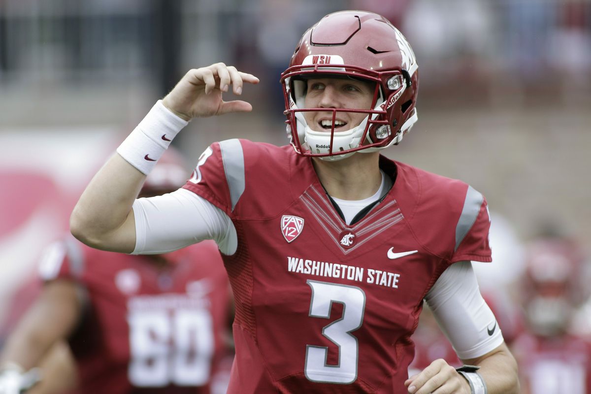 In this Sept. 17, 2016, photo, Washington State quarterback Tyler Hilinski runs onto the field with his teammates before a football game against Idaho, in Pullman.  (Associated Press)