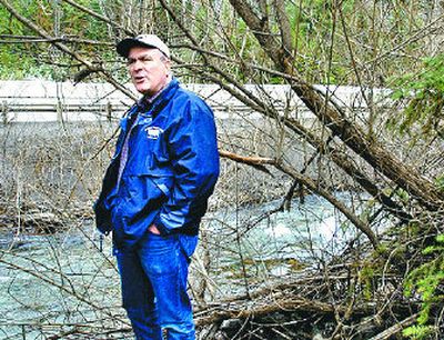 
Mike Dexter, manager of the Lucky Friday mine, talks about water quality as he stands along the south fork of the Coeur d''Alene River  on Thursday. 
 (Jesse Tinsley / The Spokesman-Review)