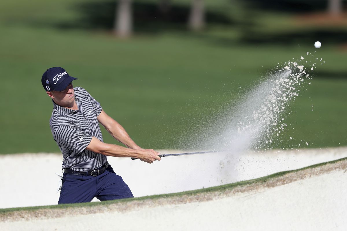 Justin Thomas hits out of the bunker on the 7th green during the second round of the Masters Friday, Nov. 13, 2020, in Augusta, Ga.  (Associated Press)