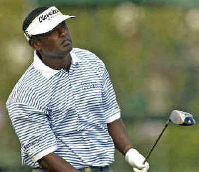 
Vijay Singh, who seems unsure whether he likes his drive on the first hole Sunday, went on to win his third major.
 (Associated Press / The Spokesman-Review)