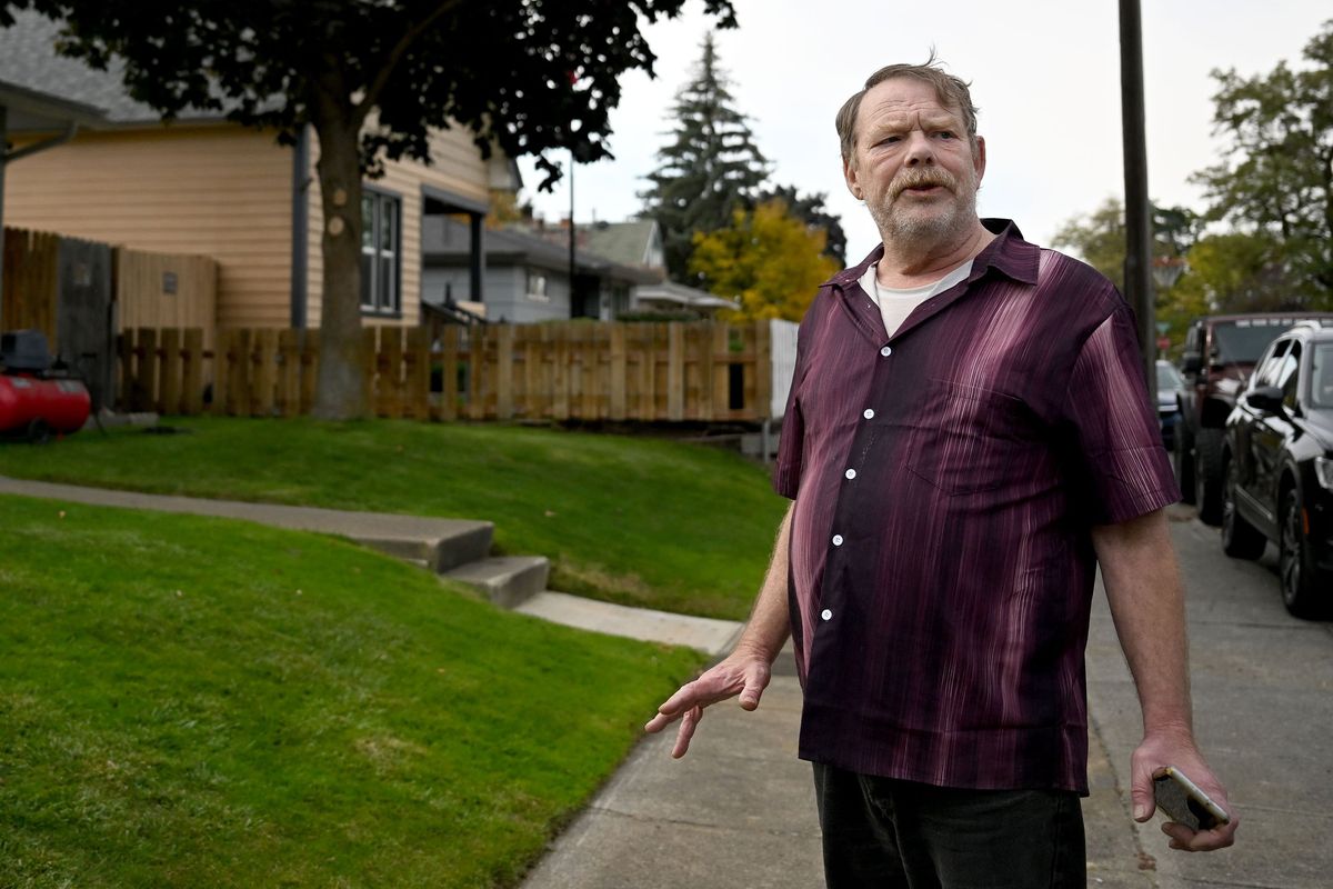 “It’s been a problem here for about three years,” Gary Dennis says about the rabbits that roam around East Queen Avenue in Spokane.  (Kathy Plonka/The Spokesman-Review)