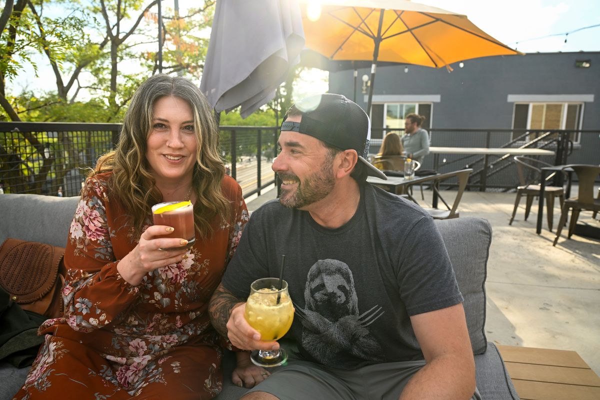 Sarah and Kurt Wood ordered drinks at North Hill on Garland restaurant where they let the bartender choose what to make on Aug. 21. The wife and husband team are avid restaurant-goers who have recorded their visits to 89 different restaurants and reviewed them online. (Jesse Tinsley/THE SPOKESMAN-REVIEW)