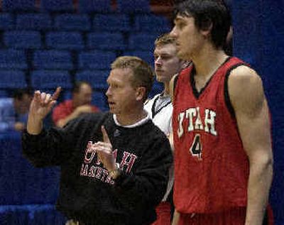 
Utah coach Ray Giacoletti has a few words of advice for Andrew Bogut, right.
 (Dan Pelle / The Spokesman-Review)