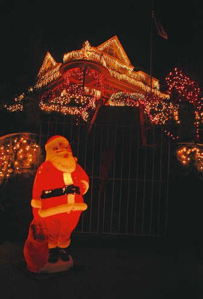 
Santa Claus greets visitors   Dec. 14 at the home of Bill and Linda Benedict in Wasco, Ore. Associated Press
 (Associated Press / The Spokesman-Review)