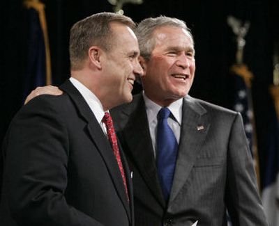 
President Bush shares a moment Tuesday with Iowa gubernatorial candidate Jim Nussle at a fundraiser in Des Moines. 
 (Associated Press / The Spokesman-Review)