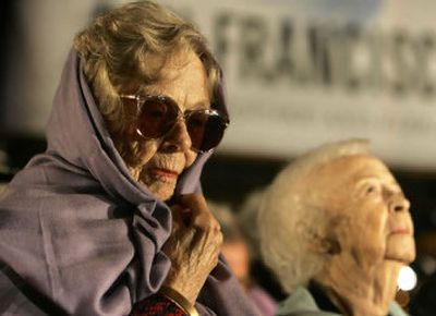 
Earthquake survivors Olive Carroll, 101, left, and Violet Lyman, 102, pause during a moment of silence at 5:12 a.m. Tuesday during the 100th anniversary of the 1906 earthquake in San Francisco.
 (Associated Press / The Spokesman-Review)