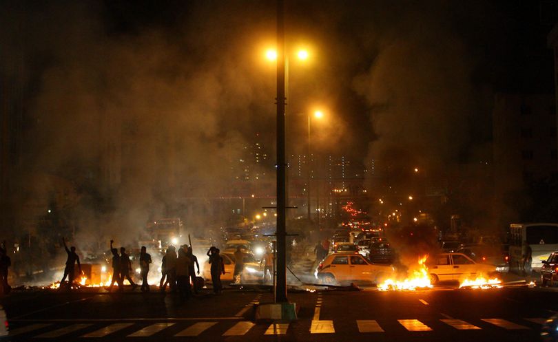 Protesters set fires in Tehran after a demonstration against the results of the presidential election. (AP)