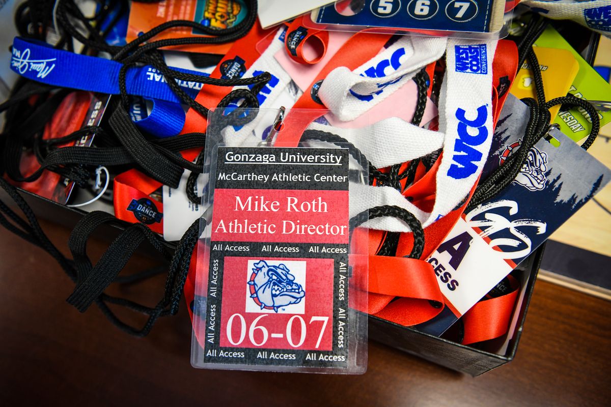 Retiring Gonzaga University athletic director Mike Roth has a box filled with event credentials he had kept over the years.  (DAN PELLE/THE SPOKESMAN-REVIEW)