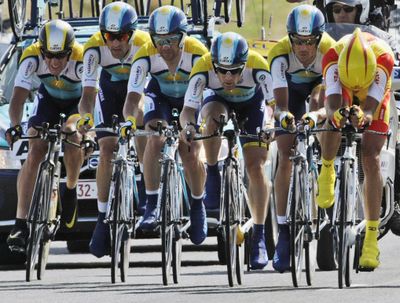 Lance Armstrong, left, and his Astana teammates stole show Tuesday.  (Associated Press / The Spokesman-Review)