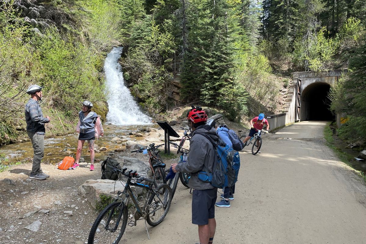 Cyclists pause along the Route of the Hiawatha.  (Courtesy of the U.S. Forest Service)