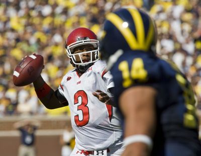 Utah’s Brian Johnson riddled Michigan’s defense for 305 yards passing.  (Associated Press / The Spokesman-Review)