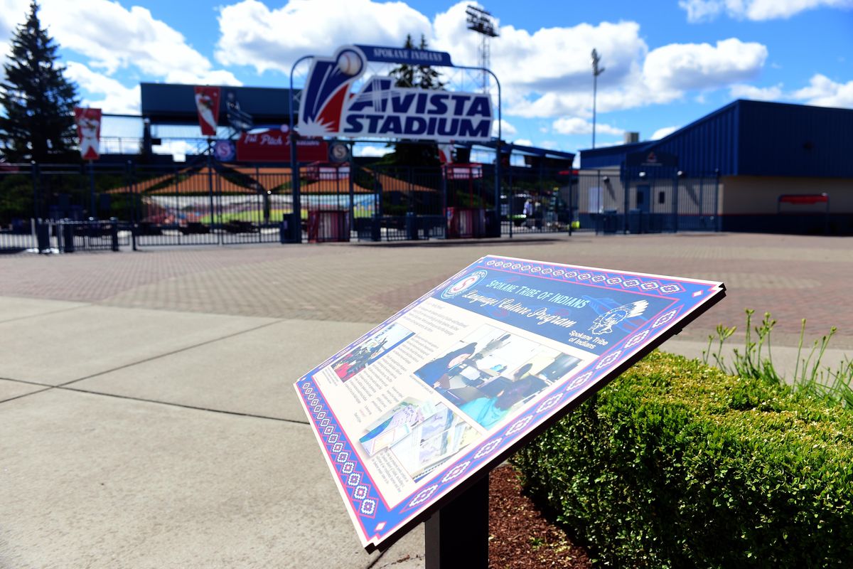 Avista Stadium sparkles every June. In recent years, signs telling about the Spokane Tribe of Indians are posted around the facility. (Jesse Tinsley / The Spokesman-Review)
