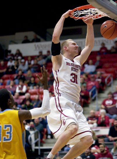 Abe Lodwick’s Cougars dominated both ends of court. (Associated Press)
