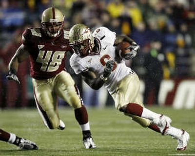 
FSU's Antone Smith runs past defenders. Associated Press
 (Associated Press / The Spokesman-Review)