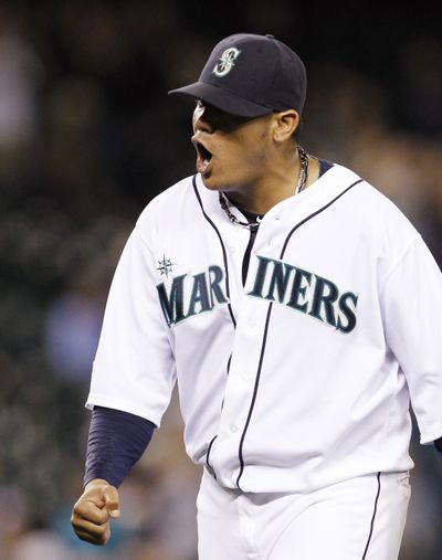 M’s Felix Hernandez struck out 13 in a five-hit complete- game victory over Boston. (Associated Press)