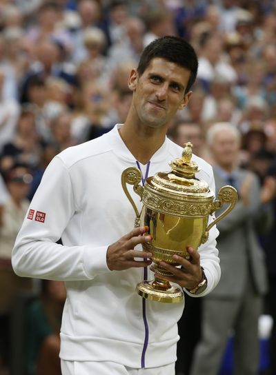 Novak Djokovic defeated Roger Federer 7-6, 6-7, 6-4, 6-3 in men’s final. (Associated Press)