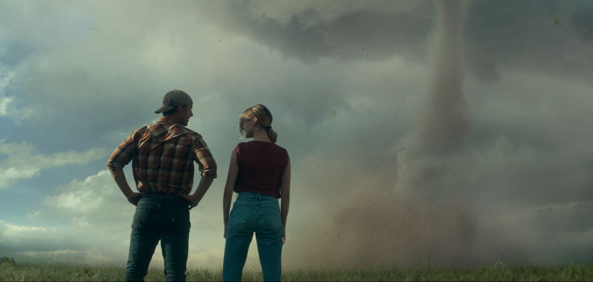 Glen Powell, left, and Daisy Edgar-Jones in “Twisters,” directed by Lee Isaac Chung.  (Universal Pictures, Warner Bros. Pictures, &amp; Amblin Entertainment)