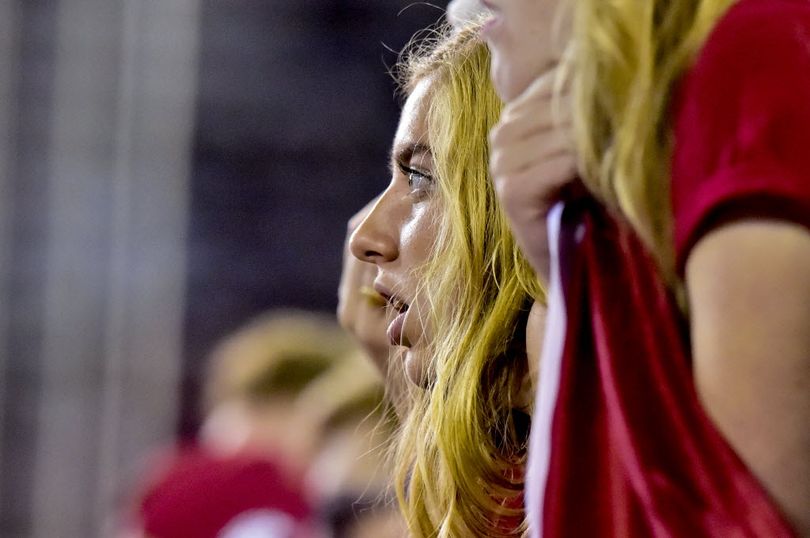 Washington State fans watch as the action unfolds against Wyoming during the second half of a college football game on Saturday at Martin Stadium in Pullman. WSU beat Wyoming, EWU beat Montana State. And Idaho edged Wooford. Anyone know when was the last time all three area college football teams won on the same weekend?