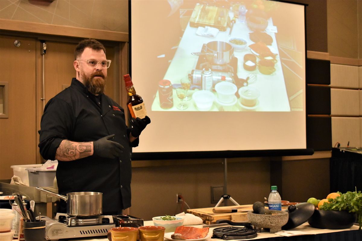 James Beard-nominated chef Chad White of Spokane leads a Maker’s Mark whiskey cooking class during the second-annual Whiskey Barrel Weekend at Coeur d’Alene Resort on Saturday afternoon.  (Don Chareunsy/The Spokesman-Review)