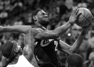 
Cleveland's LeBron James drives the lane against Detroit in Game 5 of the Eastern Conference finals Thursday.
 (Associated Press / The Spokesman-Review)