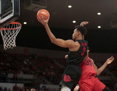 Gonzaga's Johnathan Williams (3) drives past Ohio State's Keita Bates-Diop in the Zags' 86-59 victory at the 2017 Phil Knight Invitational tournament in Portland.  (Associated Press)