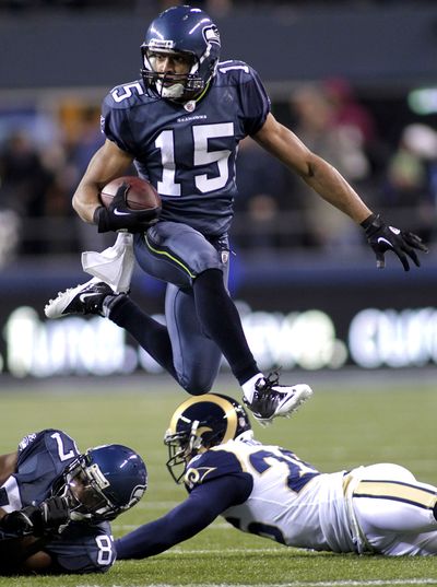 Rookie Doug Baldwin was active Monday, blocking a punt and later scoring on a 29-yard pass play. (Associated Press)