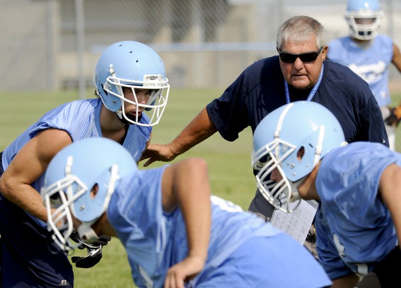 CV Bears tight end Beau Byus, above left, lines up under the watchful eye of head coach Rick Giampietri. (Jesse Tinsley)