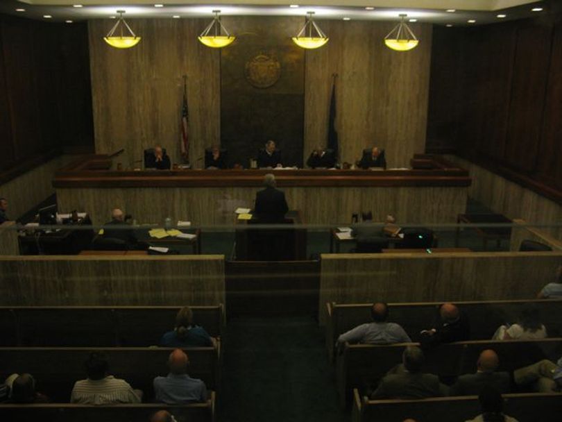The Idaho Supreme Court hears an appeal from District Judge John Bradbury, of Lewiston, of the Idaho Judicial Council's attempt to suspend him from office because they charged he doesn't live in his district, though he has a home there. (Betsy Russell / The Spokesman-Review)