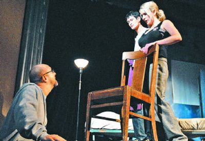 
Director Stan Brown, left, instructs  Cristofer Jean and Ulrike Rosser before they begin a rehearsal of the play 