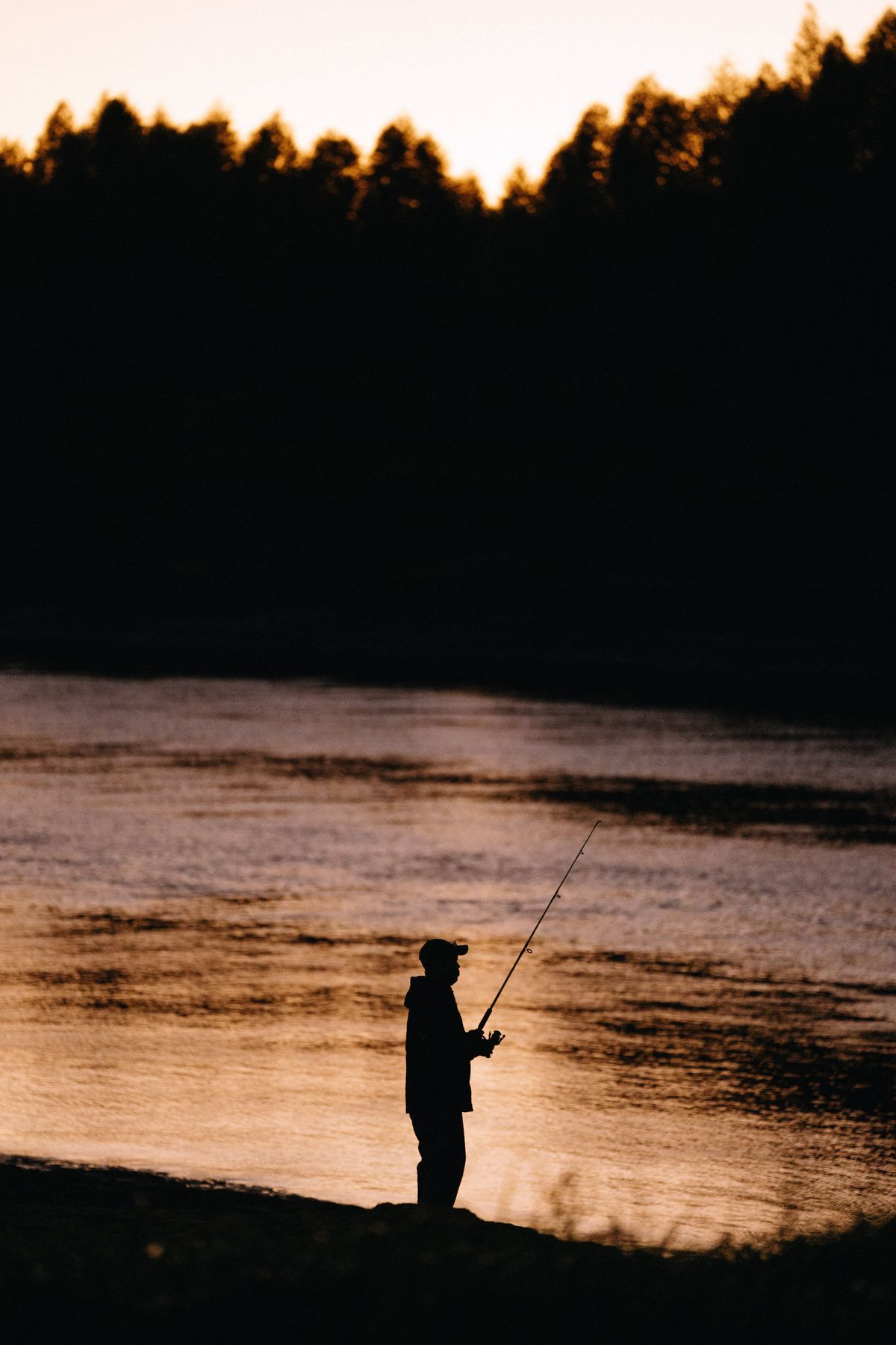 A man fishes in the Yazoo River in Vicksburg, Miss., on Oct. 25, 2022. Fishing in the Yazoo has been affected by the lower water levels of the Mississippi River. (Lucy Garrett/The New York Times)  (LUCY GARRETT)