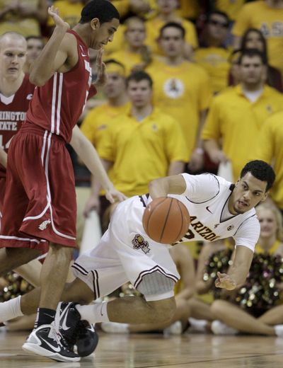 WSU’s Will DiIorio, left, watches ASU’s Trent Lockett lose ball. (Associated Press)