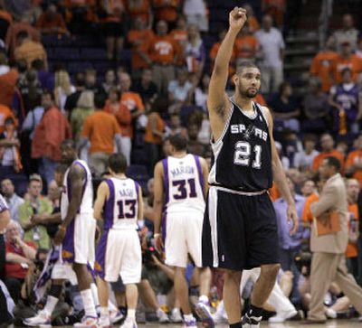 
San Antonio's Tim Duncan celebrates after defeating Phoenix in game 1 of the Western Confrence semifinals.
 (Associated Press / The Spokesman-Review)