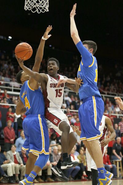 Stanford guard Marcus Allen (15) drives to the basket in UCLA’s win over the Cardinal. (Associated Press)