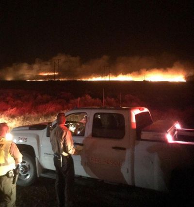 Level three evacuation notices were issued near the town of Quincy Wednesday night as a rapidly shifting wildfire spread through the area. (Tom Jones / Grant County Sheriff’s Office)