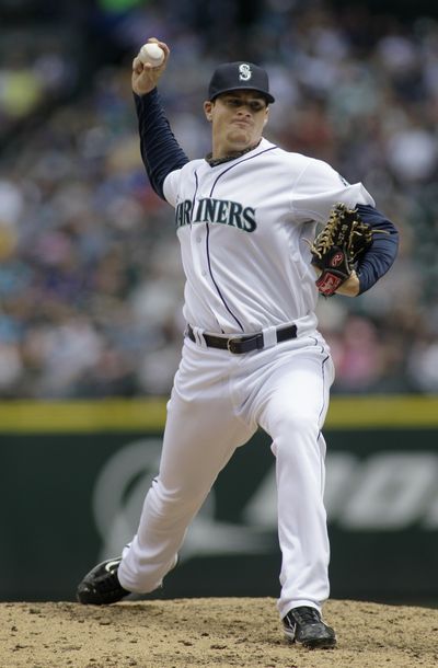 Mariners starter Blake Beavan won his MLB debut. (Associated Press)