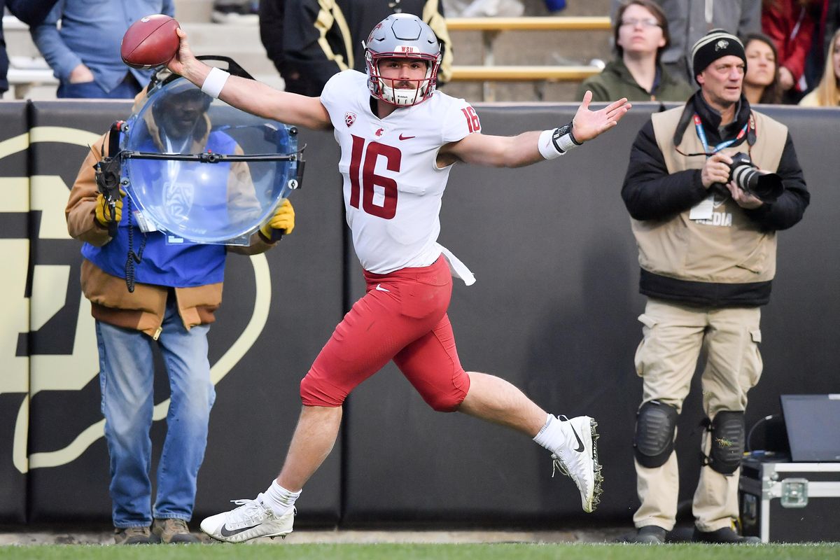 Washington State Cougars quarterback Gardner Minshew (16) runs the ball for a touchdown during the second half of a college football game on Saturday, November 10, 2018, at Folsom Field in Boulder Colo. WSU won the game 31-7. (Tyler Tjomsland / The Spokesman-Review)